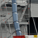 Rubbish chutes attached to scaffolding
