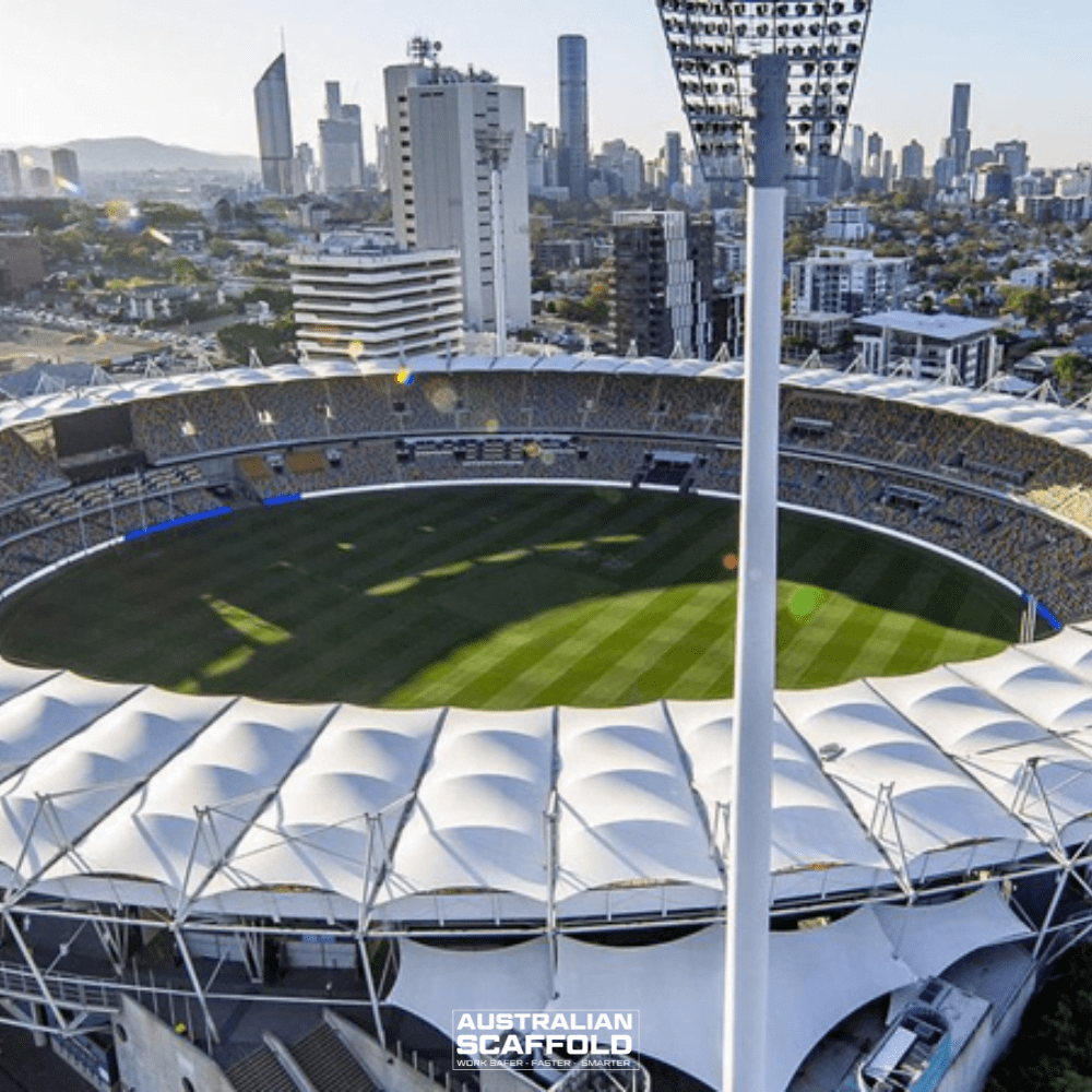 Aerial night view of Brisbane Cricket Ground with illuminated field