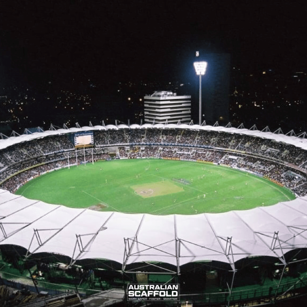 Aerial night view of Brisbane Cricket Ground with illuminated field